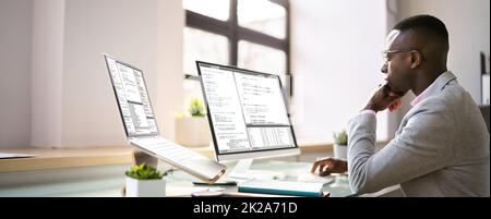 African American Programmer Man Coding Stock Photo