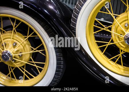Spare wheel on classic retro car Stock Photo