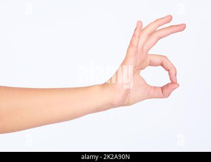 All is a-okay. Cropped image of a hand giving the okay sign. Stock Photo