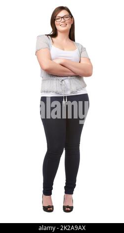 Self-assured young professional. Shot of a beautiful plus size model isolated on white. Stock Photo