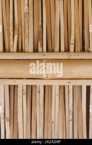 Old brown tone bamboo plank fence texture . Stock Photo
