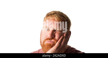 Man looking fed up and bored. Stock Photo