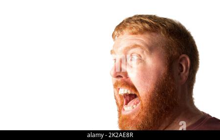 Male close up head shot of him with a shouting expression. Stock Photo