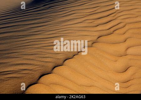 Patterns and textures in the sand Stock Photo