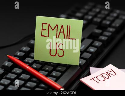 Conceptual caption Email Us. Word for Sending a commercial message to a group of showing using mail Copying Old Ideas And Creating New Ones, Transferring Written Notes Stock Photo