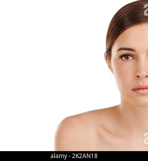 Her best side. Cropped portrait of a beautiful young woman isolated on white. Stock Photo