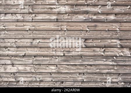 Background from a wall made of horizontal wooden planks Stock Photo
