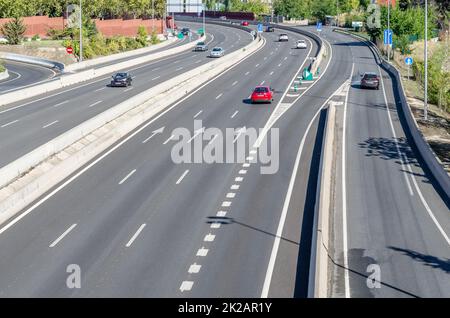 MADRID, SPAIN - SEPTEMBER 26, 2021: View from above of a motorway passing through Madrid, Spain Stock Photo