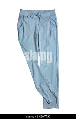 Sweat pants isolated. Close-up of womans fashionable blue casual trousers or jersey trousers isolated on a white background. Jogging outfit for workout. Clipping path. Stock Photo