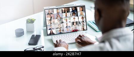 Virtual Business Presentation Or Videoconferencing On Hybrid Screen Stock Photo