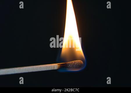 match is burning hot on black Stock Photo