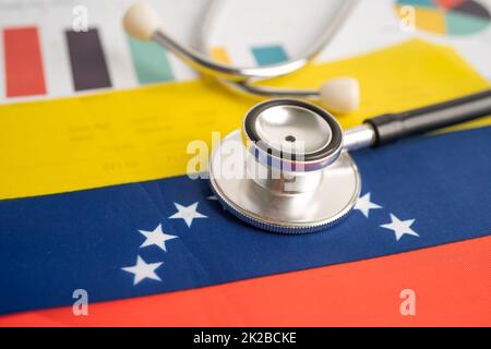 Black stethoscope on venezuela flag with graph background, Business and finance concept. Stock Photo