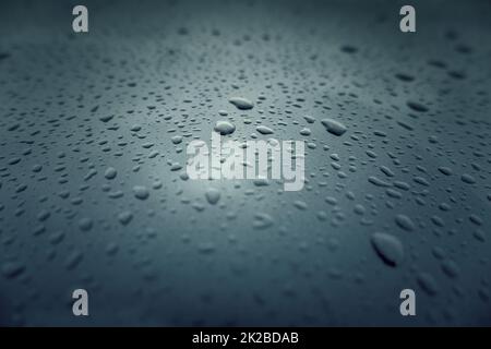 Water drops on surface Stock Photo