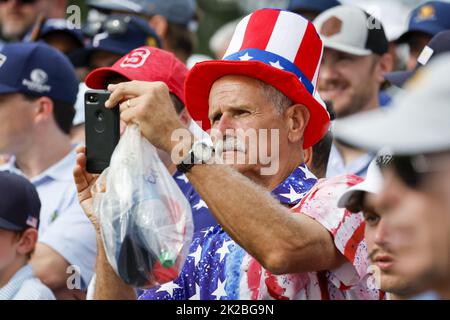 Charlotte, United States. 22nd Sep, 2022. A fan supporting USA team takes a photo at the Presidents Cup golf championship in Charlotte, North Carolina on September 22, 2022. Photo by Nell Redmond/UPI. Credit: UPI/Alamy Live News Stock Photo