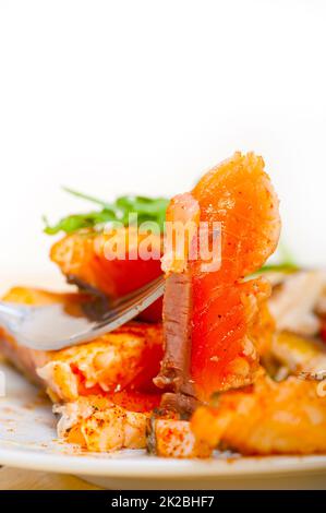 grilled samon filet with vegetables salad Stock Photo