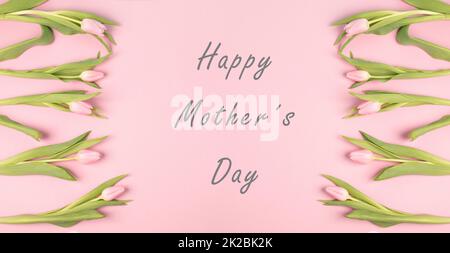 Happy motherÂ´s day, pink tulips building a frame, greeting card with flowers