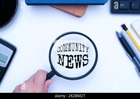 Inspiration showing sign Community News. Business idea news coverage that typically focuses on city neighborhoods Office Supplies Over Desk With Keyboard And Glasses And Coffee Cup For Working Stock Photo
