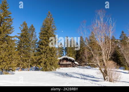 Hut at frozen lake Loedensee near Ruhpolding, Bavaria, Germany Stock Photo