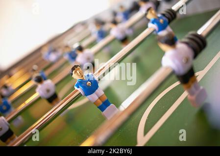 Foosball fun. A close-up image of a foosball table. Stock Photo