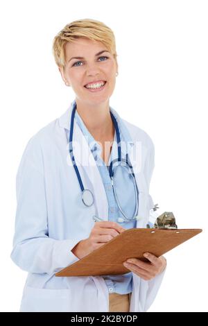 Shell have you up and running in no time. A young female doctor writing on a clipboard. Stock Photo