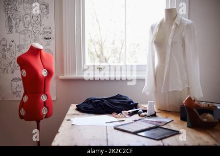 Designing tools. Shot of a clothing designers office. Stock Photo