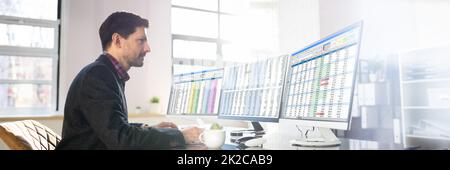 Data Analyst Man Using Spreadsheet Stock Photo