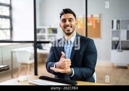 Adult Learning Sign Language Stock Photo