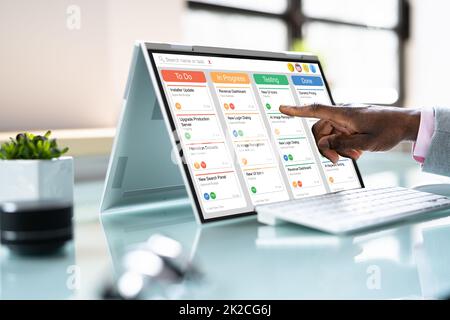 Kanban Project Management Software On Laptop Stock Photo