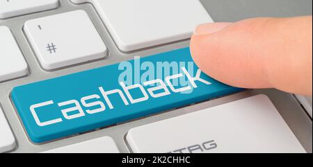 A keyboard with a blue labeled button - Cashback Stock Photo