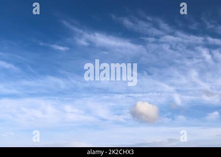 Stunning cirrus cloud formation panorama in a deep blue sky Stock Photo