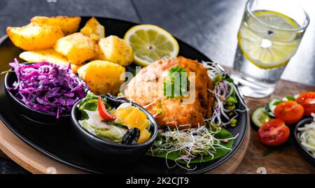 Pulled chicken cutlet coated with breadcrumbs Stock Photo