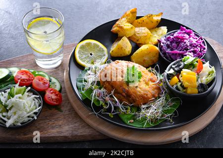 Pulled chicken cutlet coated with breadcrumbs Stock Photo