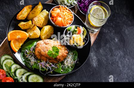 Pulled chicken cutlet coated with breadcrumbs Stock Photo