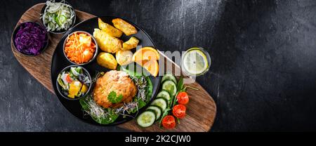 Pulled chicken cutlet coated with breadcrumbs Stock Photo