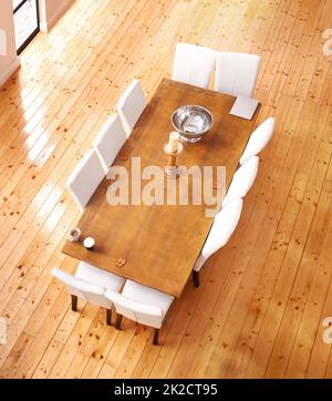 Dining in pine. High angle shot of a stylish dining table. Stock Photo