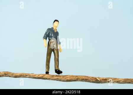 Man walks on a rope Stock Photo