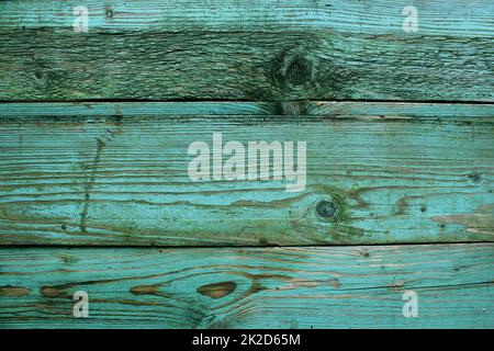 Old rustic wooden planks painted in turquoise color. Backgrounds concept Stock Photo