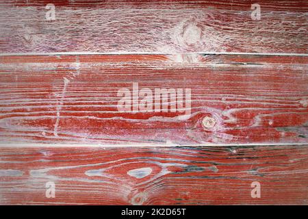 Old rustic wooden planks painted in red color. Backgrounds concept Stock Photo