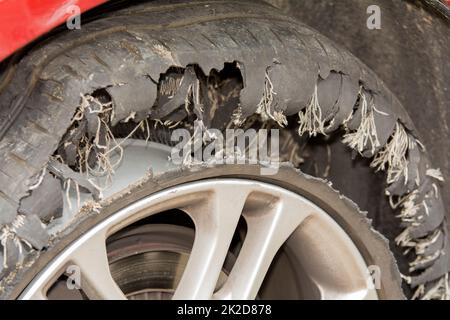 a dmages exploding wheel in closeup Stock Photo