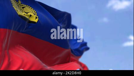 Detail of the national flag of Liechtenstein waving in the wind on a clear day Stock Photo