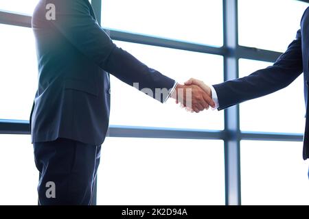 Its a done deal. Cropped shot of businesspeople working in the office. Stock Photo