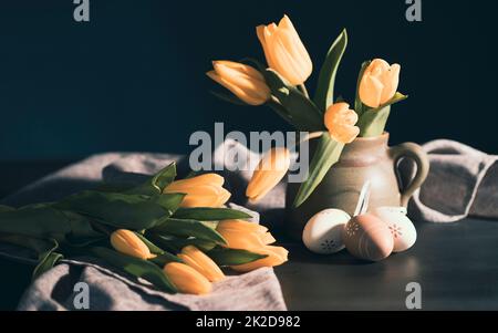 Easter holiday composition on wooden table over vintage background Stock Photo