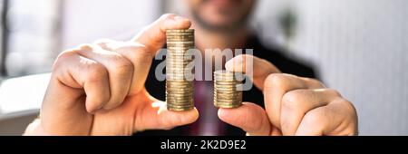 Compare Wage And Money Gap Stock Photo