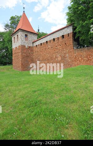 A tower and a fragment of city walls from the 14th century near Krakow, Olkusz, Poland Stock Photo