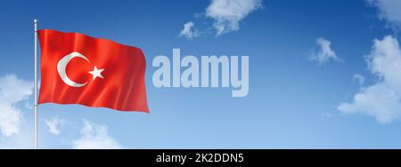 Turkish flag isolated on a blue sky. Horizontal banner Stock Photo