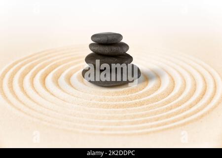 Zen japanese garden and black stones background Stock Photo