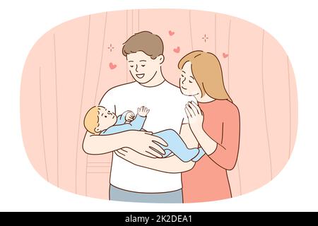 Happy loving young family holding newborn baby Stock Photo