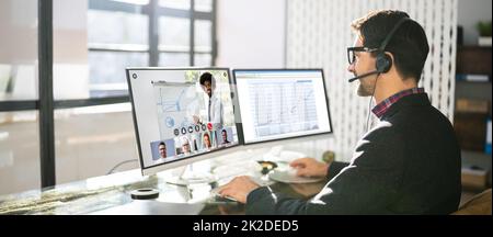 Online Virtual Video Conference Training On Desktop Computer Stock Photo