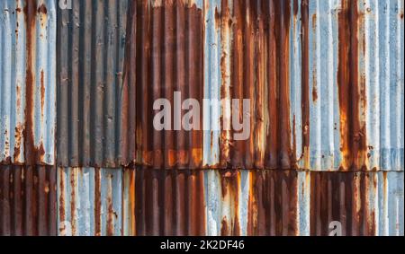 Rusty corrugated galvanised iron wall texture for background. Stock Photo