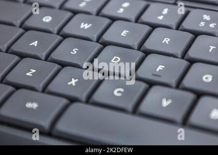 Closeup shot of a modern black computer keyboard Stock Photo